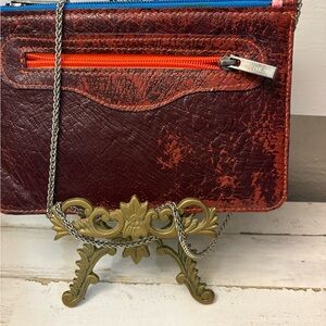 Distressed Brown Leather Crossbody with Orange Zip Accent
